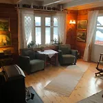 100 Years Old Norwegian Log House In Tromsø