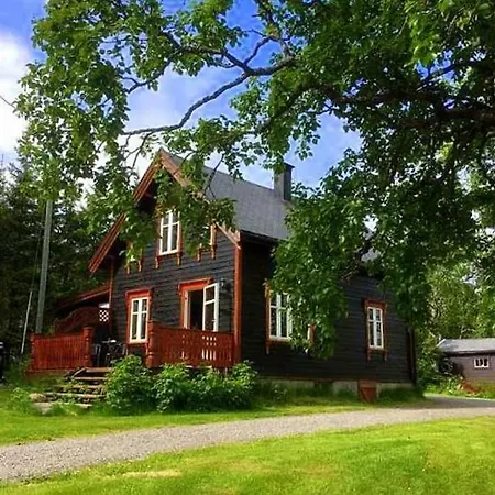100 Years Old Norwegian Log House In Tromso