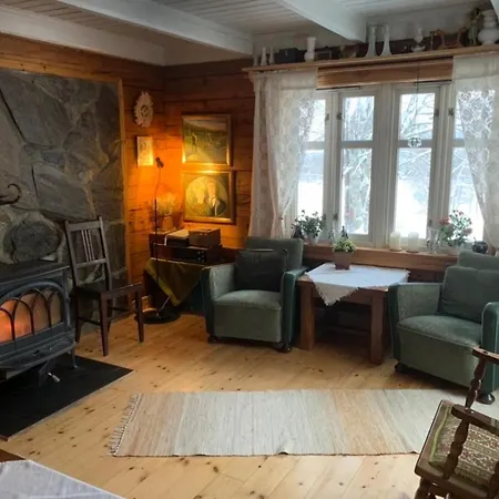 100 Years Old Norwegian Log House In * Tromso