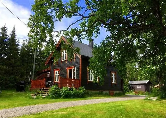 100 Years Old Norwegian Log House In Tromsø